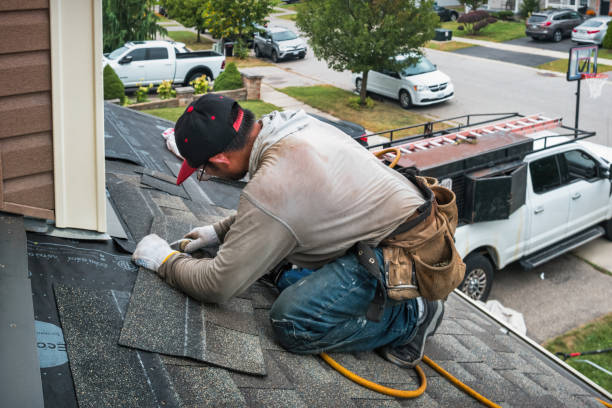 Professional Storm Damage Roof Repair technician working in Harrison, WI